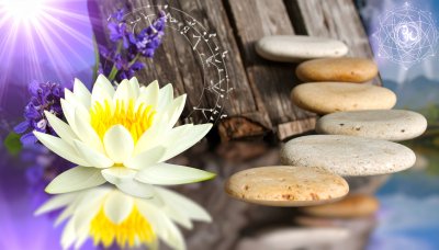 Zen lotus blossom, balanced stones, and spiritual harmony