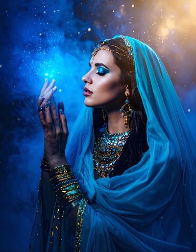 Mystical woman conjuring blue magic, opulent attire