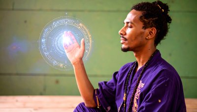 Man Meditating with Mystical Cosmic Energy Circle