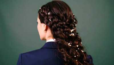 Elegant braided hairstyle with pearls