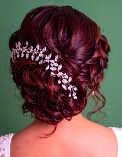 Bride with elegant updo and sparkling crystal hair accessory