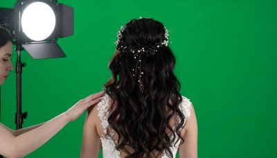 Bride with elegant hairstyle on green screen compositing