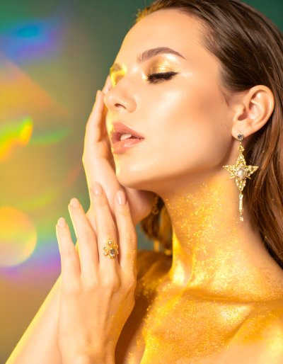 Golden goddess with glitter skin and star earring