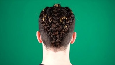 Braided hair with gold accents on green screen for compositing