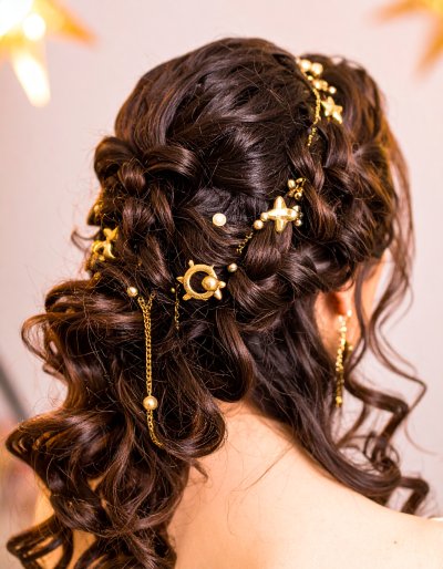 Braided Updo with Celestial Gold Charms and Pearls
