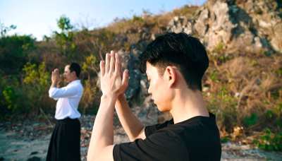 Seaside Meditation: Two figures finding peace on the beach