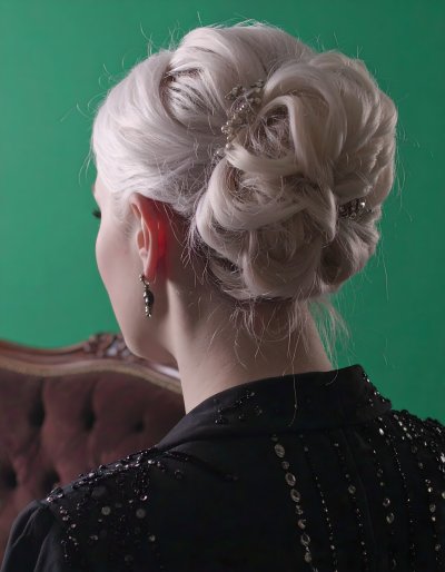 Elegant woman updo, beaded dress, green screen for compositing