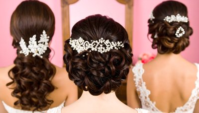 Sparkling bridal hairstyles with tiaras for wedding celebration