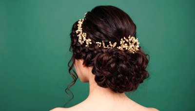 Bride with updo and gold accessory on green screen
